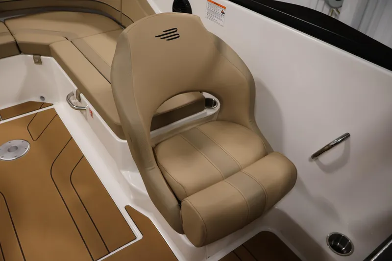 Slide: The Image of 2026 Bayliner V20 boat interior with beige seating and sleek design. - 24
