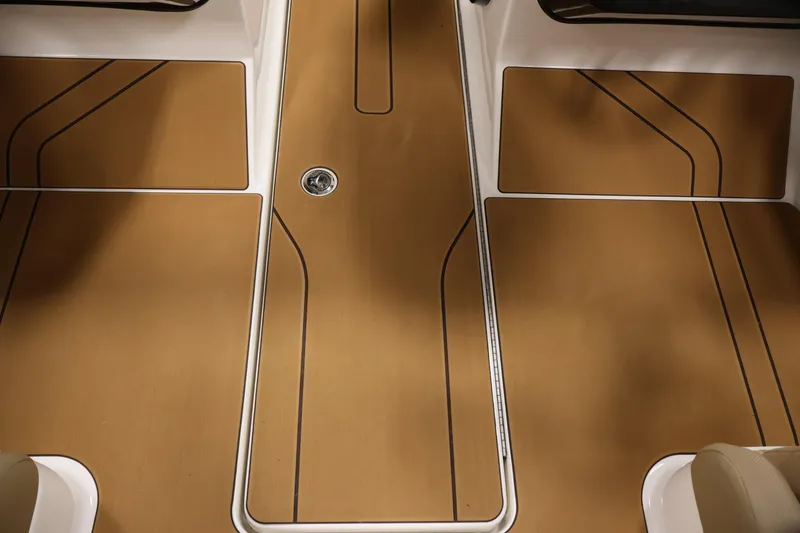 Slide: The Image of 2026 Bayliner V20 boat deck with sleek, modern design and wood-like finish. - 26