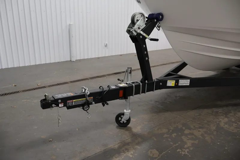 Slide: The Image of 2026 Bayliner V20 boat trailer hitch in a garage setting. - 36