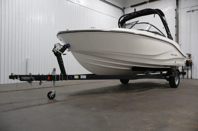 Slide: The Image of 2026 Bayliner V20 boat on trailer in indoor storage facility. - 37