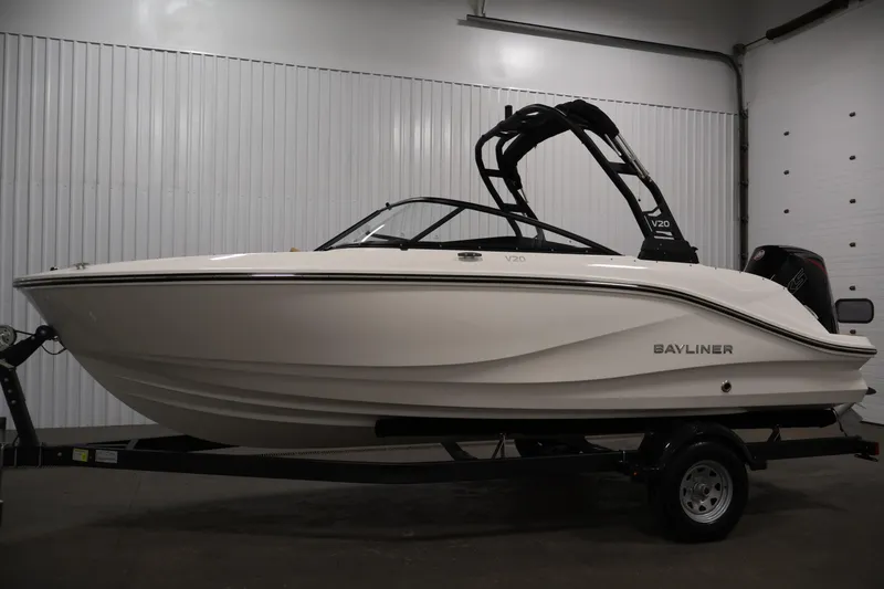 Slide: The Image of 2026 Bayliner V20 boat on trailer in indoor setting. - 7