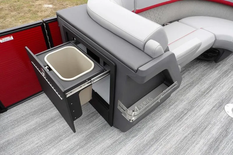 Slide: The Image of 2026 Bennington M Swingback 22 MSB boat interior with pull-out storage compartment. - 11