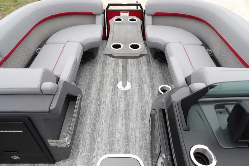 Slide: The Image of 2026 Bennington M Swingback 22 MSB interior with gray seating and central table. - 14