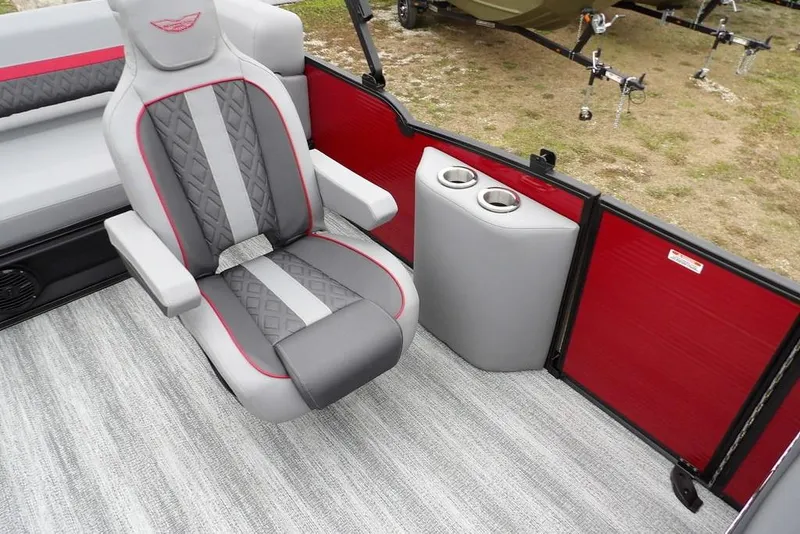 Slide: The Image of 2026 Bennington M Swingback 22 MSB interior with gray and red seating, cup holders. - 17