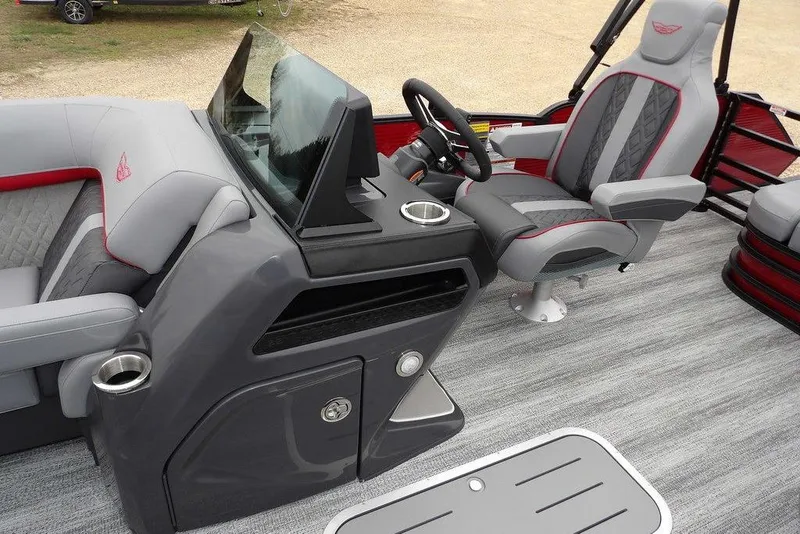 Slide: The Image of 2026 Bennington M Swingback 22 MSB boat interior with modern seating and steering console. - 18