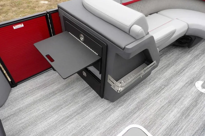 Slide: The Image of 2026 Bennington M Swingback 22 MSB interior with sleek seating and pull-out table. - 19