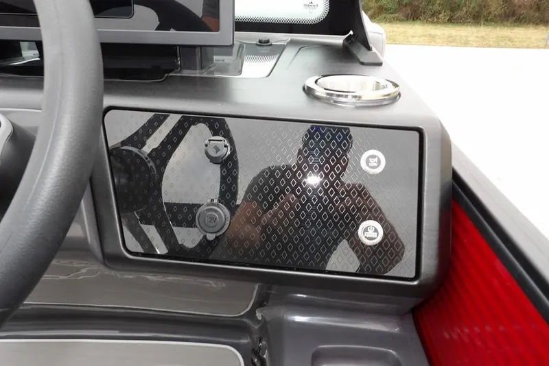 Slide: The Image of Dashboard of 2026 Bennington M Swingback 22 MSB with steering wheel and control panel. - 23