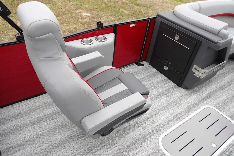 Slide: The Image of 2026 Bennington M Swingback 22 MSB interior with gray seating and red accents. - 27