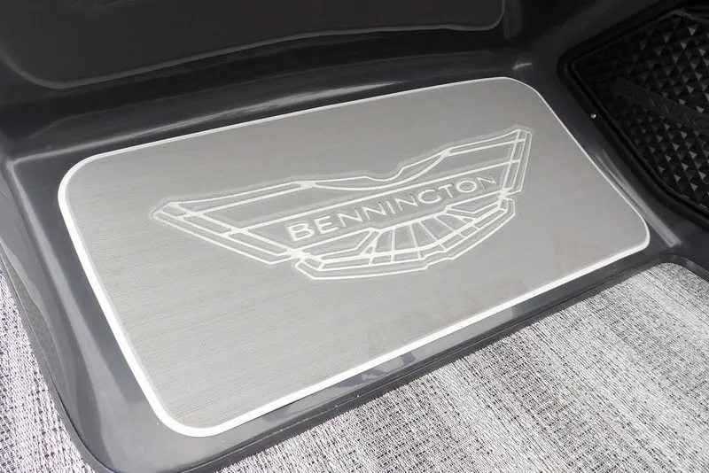 Slide: The Image of 2026 Bennington M Swingback 22 MSB logo on boat floor mat. - 28