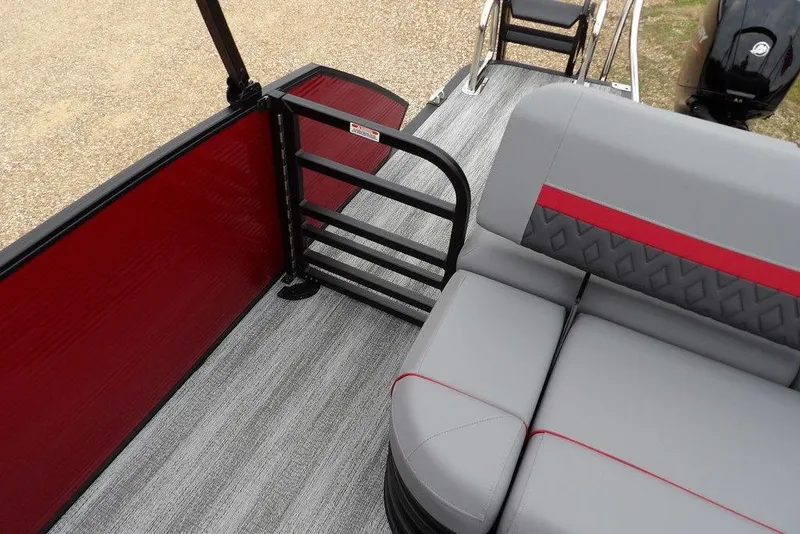 Slide: The Image of 2026 Bennington M Swingback 22 MSB boat interior with gray and red seating. - 32