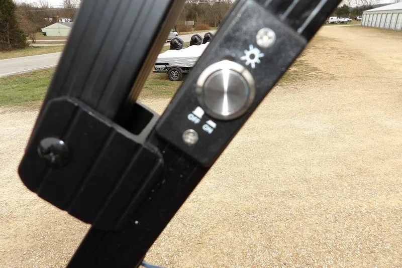 Slide: The Image of Close-up of a control knob on a 2026 Bennington M Swingback 22 MSB boat. - 42