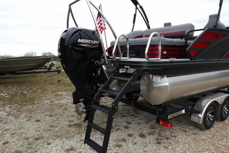 Slide: The Image of 2026 Bennington M Swingback 22 MSB pontoon boat with Mercury engine and ladder. - 46