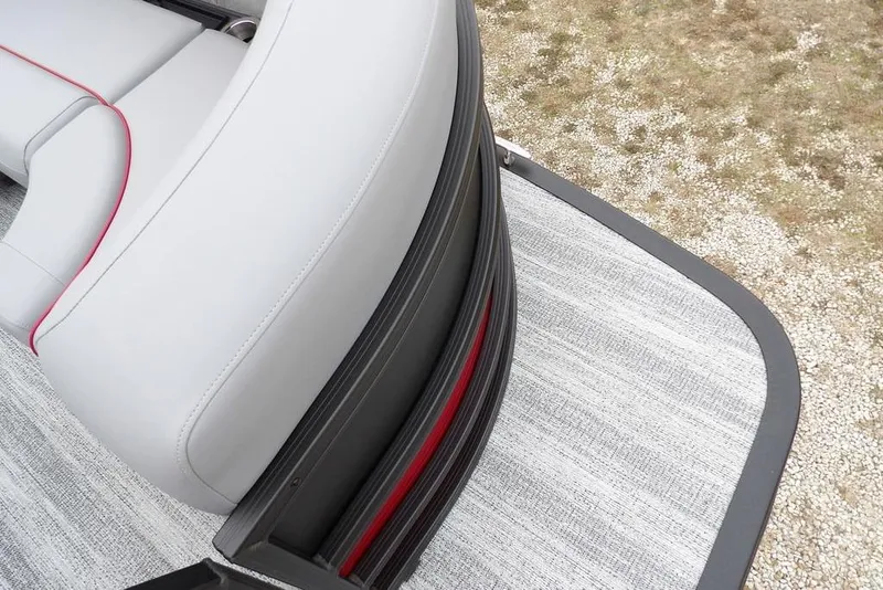 Slide: The Image of 2026 Bennington M Swingback 22 MSB boat seat with sleek design and red accents. - 9