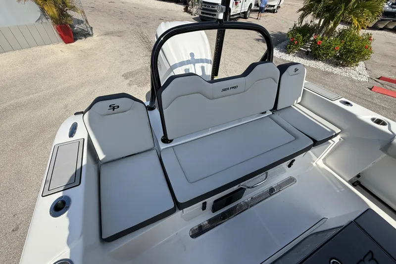 Slide: The Image of 2025 Sea Pro 245FLX Sandbar boat interior with sleek seating and modern design. - 14