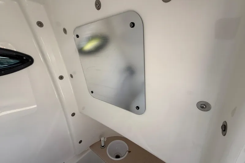 Slide: The Image of Interior view of 2025 Sea Pro 245FLX Sandbar boat, featuring sleek design elements. - 34