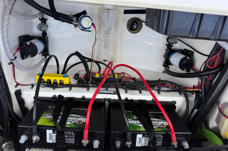 Slide: The Image of Electrical system of 2025 Sea Pro 245FLX Sandbar boat with batteries and wiring. - 43