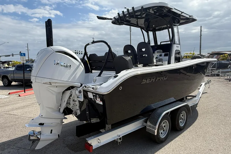 Slide: The Image of 2025 Sea Pro 245FLX Sandbar boat on trailer with Yamaha outboard engine. - 7