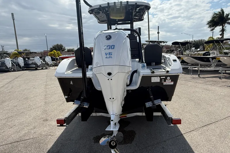 Slide: The Image of 2025 Sea Pro 245FLX Sandbar boat with Yamaha 300 V6 engine, displayed outdoors. - 8