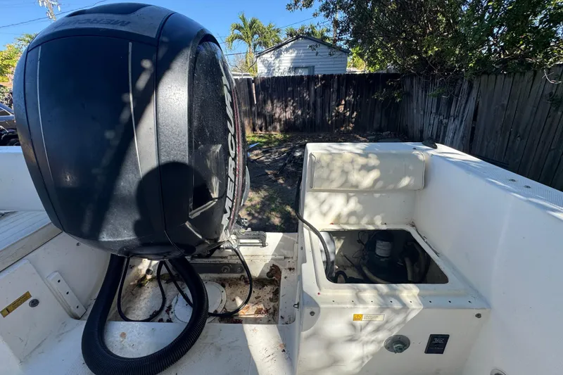 Slide: The Image of 1993 Hydra-Sports Bay Bolt 1900 boat interior with steering console and seating. - 13