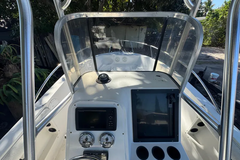 Slide: The Image of Open storage compartment on 1993 Hydra-Sports Bay Bolt 1900 boat deck. - 14