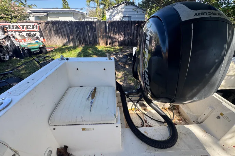 Slide: The Image of 1993 Hydra-Sports Bay Bolt 1900 boat canopy under clear blue sky. - 16