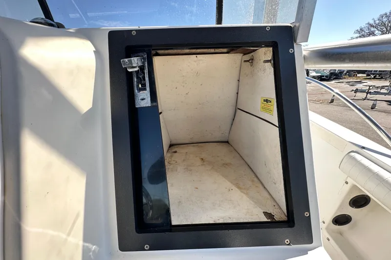 Slide: The Image of Open storage compartment on 1993 Hydra-Sports Bay Bolt 1900 boat. - 25