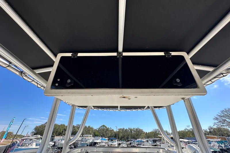 Slide: The Image of 1993 Hydra-Sports Bay Bolt 1900 boat with T-top and storage compartment. - 26