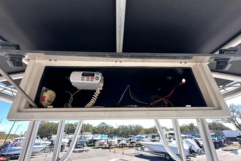 Slide: The Image of 1993 Hydra-Sports Bay Bolt 1900 boat console with radio equipment and wiring. - 27