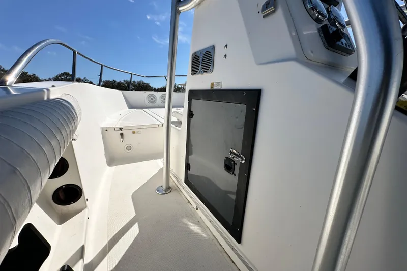 Slide: The Image of 1993 Hydra-Sports Bay Bolt 1900 boat interior with seating and control panel. - 30