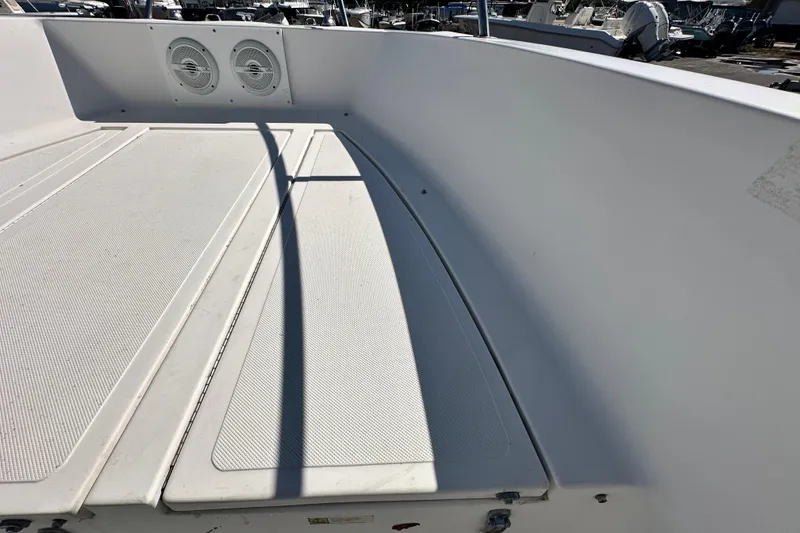 Slide: The Image of 1993 Hydra-Sports Bay Bolt 1900 boat interior with deck and speakers. - 42