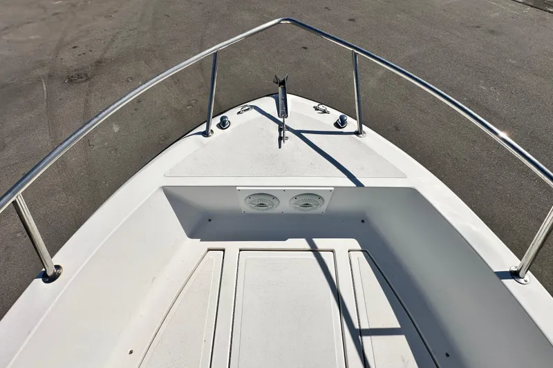 Slide: The Image of 1993 Hydra-Sports Bay Bolt 1900 boat deck with stainless steel railing. - 44