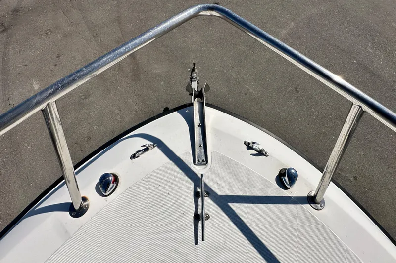 Slide: The Image of Bow of 1993 Hydra-Sports Bay Bolt 1900 boat with stainless steel railings. - 46