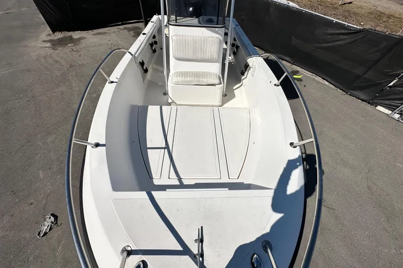 Slide: The Image of 1993 Hydra-Sports Bay Bolt 1900 boat deck, featuring spacious seating and sleek design. - 47