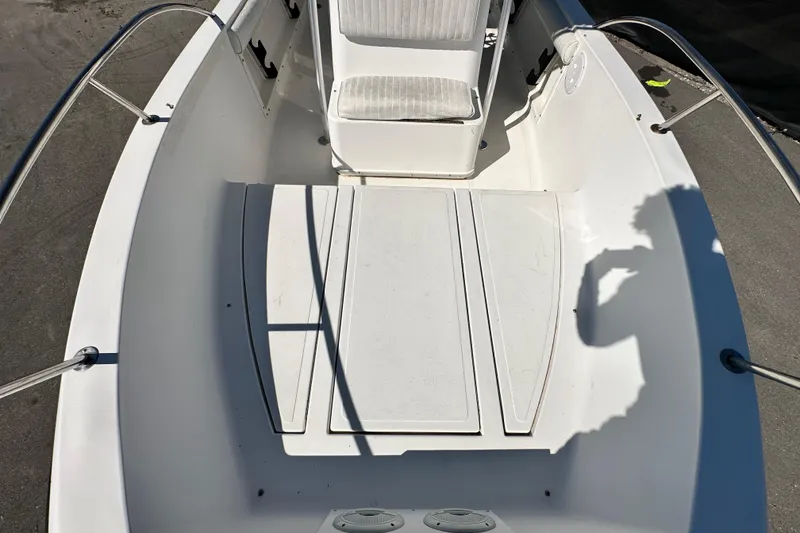 Slide: The Image of 1993 Hydra-Sports Bay Bolt 1900 boat interior with seating and storage compartments. - 49