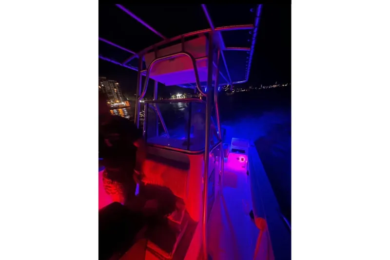 Slide: The Image of 1993 Hydra-Sports Bay Bolt 1900 boat on trailer, rear view with propeller. - 5