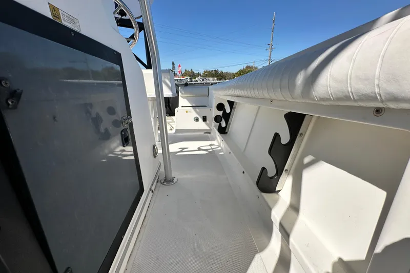 Slide: The Image of 1993 Hydra-Sports Bay Bolt 1900 boat interior with seating and storage compartments. - 56