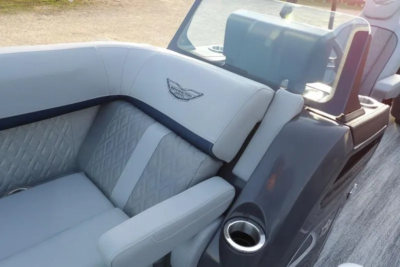 Slide: The Image of 2026 Bennington M Swingback 22 MSB boat interior with luxurious seating and cup holder. - 11