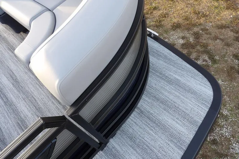 Slide: The Image of 2026 Bennington M Swingback 22 MSB boat with sleek seating and textured flooring. - 12