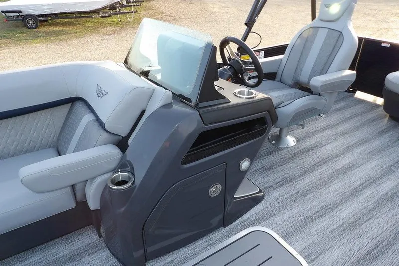 Slide: The Image of 2026 Bennington M Swingback 22 MSB interior with modern helm and seating. - 16