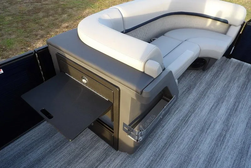 Slide: The Image of 2026 Bennington M Swingback 22 MSB pontoon boat interior with sleek seating and storage. - 17