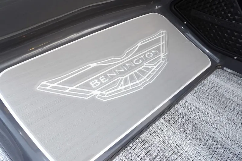 Slide: The Image of Bennington M Swingback 22 MSB 2026 logo on sleek boat flooring. - 38