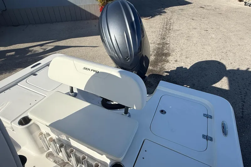 Slide: The Image of 2025 Sea Pro 210 Bay boat console with steering wheel and controls. - 16