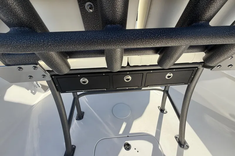 Slide: The Image of 2025 Sea Pro 210 Bay boat dashboard with steering wheel and control panel. - 32