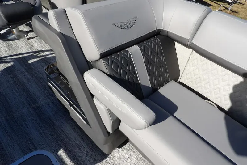 Slide: The Image of 2026 Bennington M Swingback 26 MSB boat interior with luxurious gray seating. - 12