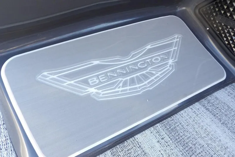 Slide: The Image of Bennington logo on 2026 M Swingback 26 MSB boat floor mat. - 26