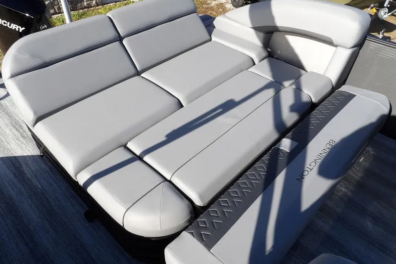 Slide: The Image of 2026 Bennington M Swingback 26 MSB boat with luxurious gray seating. - 32
