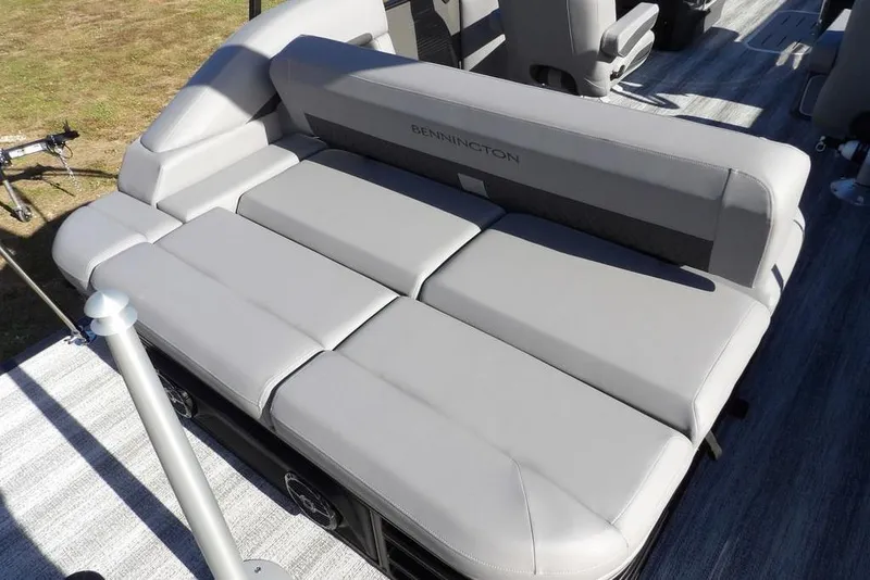 Slide: The Image of 2026 Bennington M Swingback 26 MSB boat with luxurious gray seating. - 34