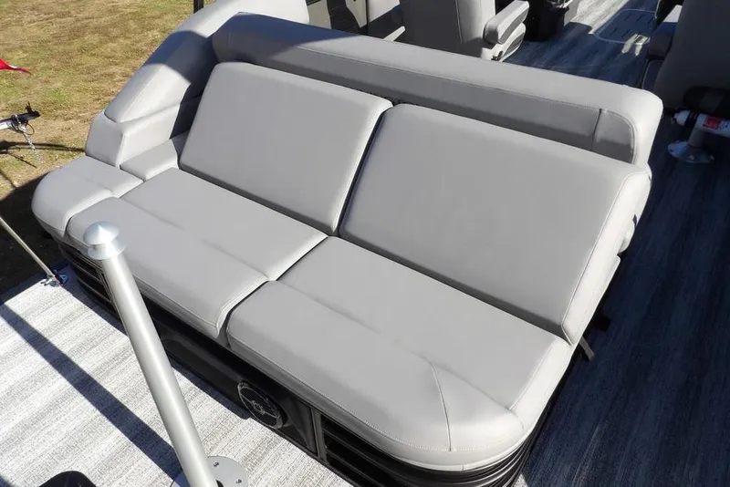 Slide: The Image of 2026 Bennington M Swingback 26 MSB boat with sleek gray seating. - 36