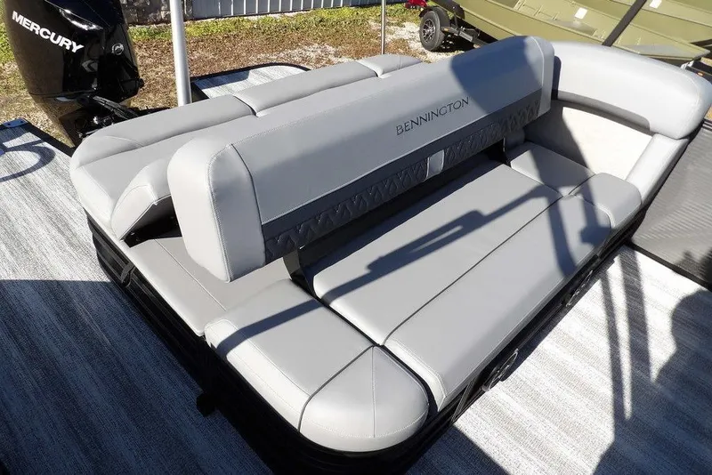 Slide: The Image of 2026 Bennington M Swingback 26 MSB boat with luxurious gray seating and Mercury engine. - 40
