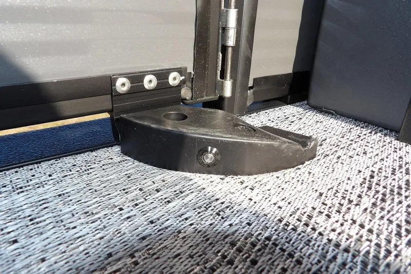 Slide: The Image of Close-up of a hinge mechanism on a 2026 Bennington M Swingback 26 MSB boat. - 41